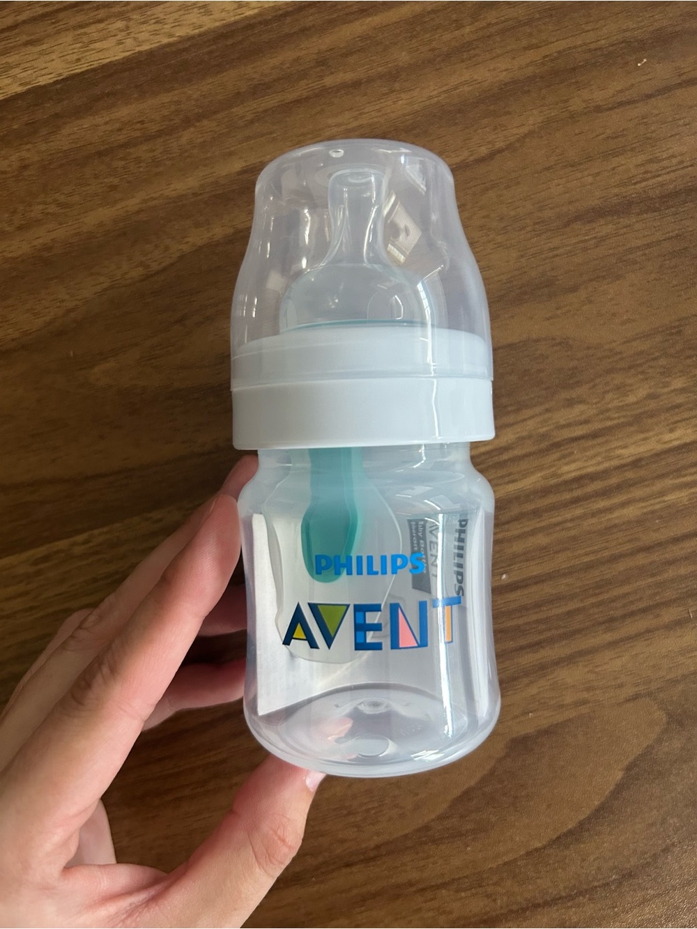 Philips Avent Clear Baby Bottle with White Cap and Teal Accent